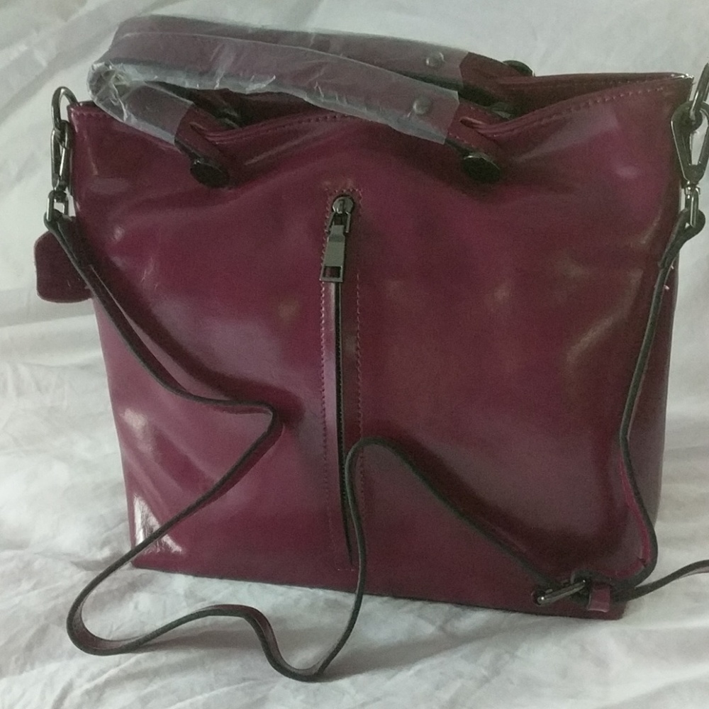 Women's leather, berry colored shoulder bag